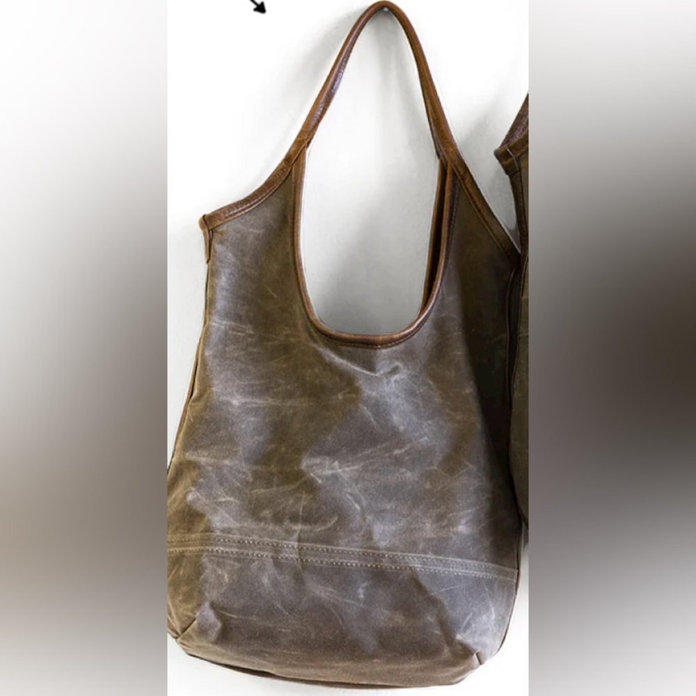 Rough & Tumble canvas sling with leather details